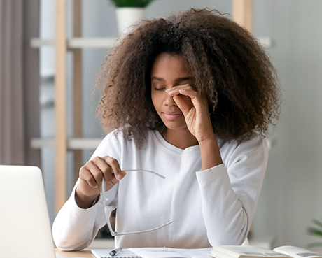 woman rubbing her dry eye